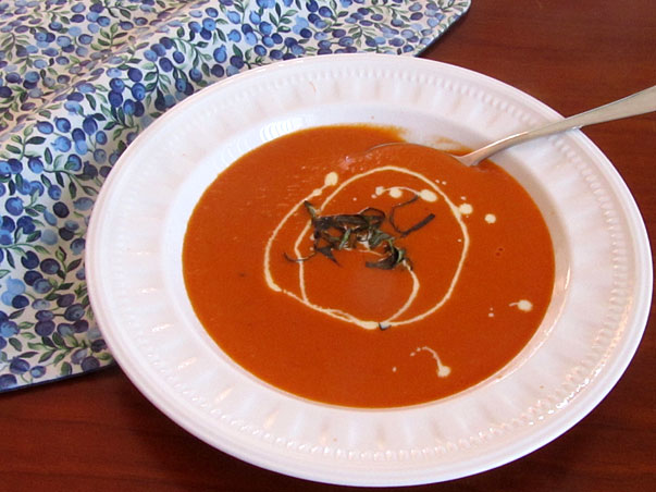 cream of tomato soup with basil chiffonade