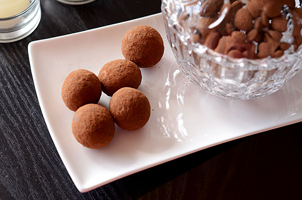 Roasted macadamia nuts covered in rose flavoured dark chocolate