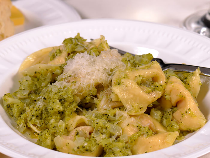 tortellini with a butter, garlic, onion and broccoli sauce
