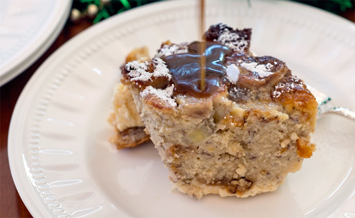 Bread pudding from banana bread with dark toffee sauce